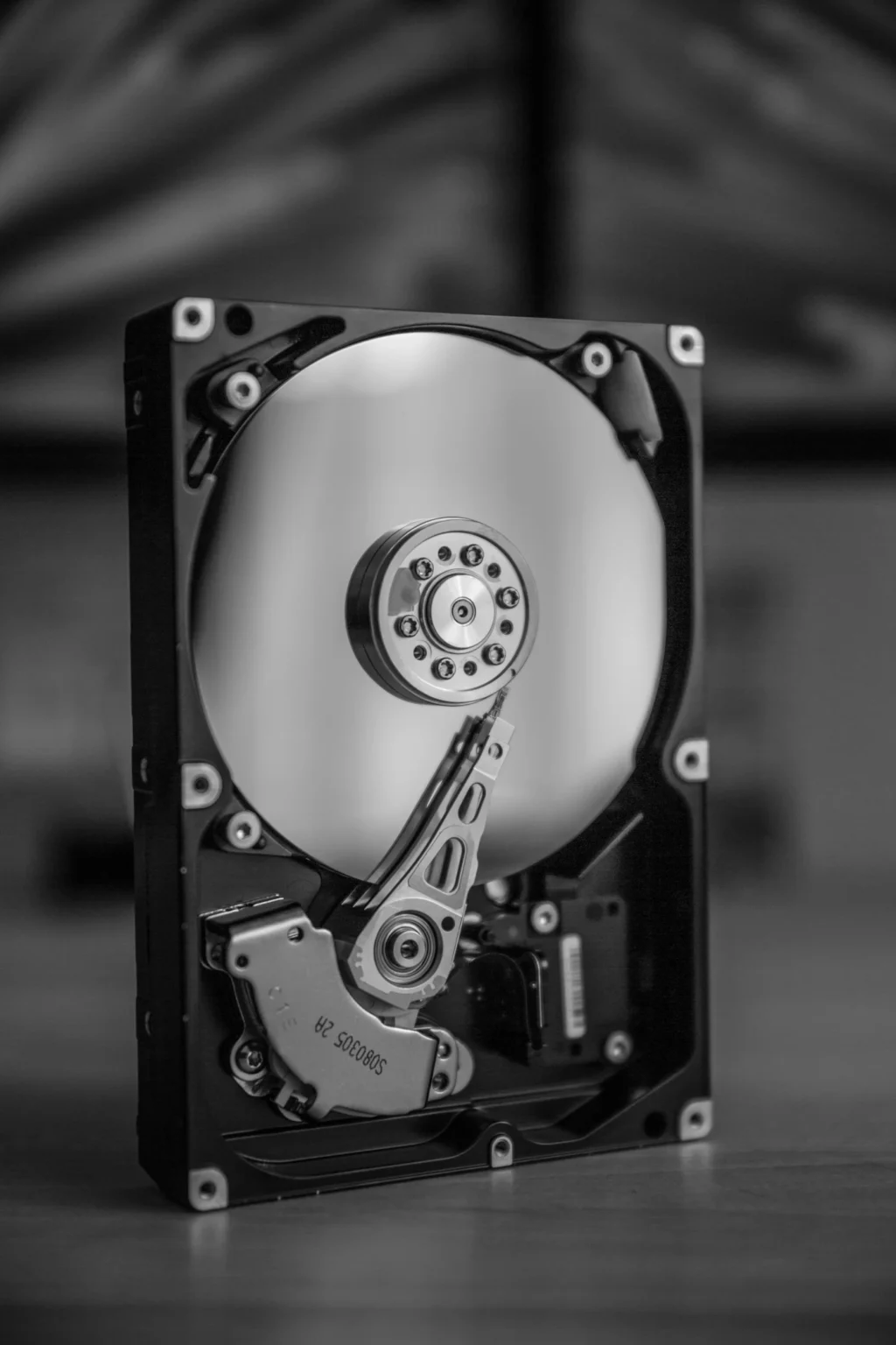 Open hard drive platter during certified ITAD in Tampa