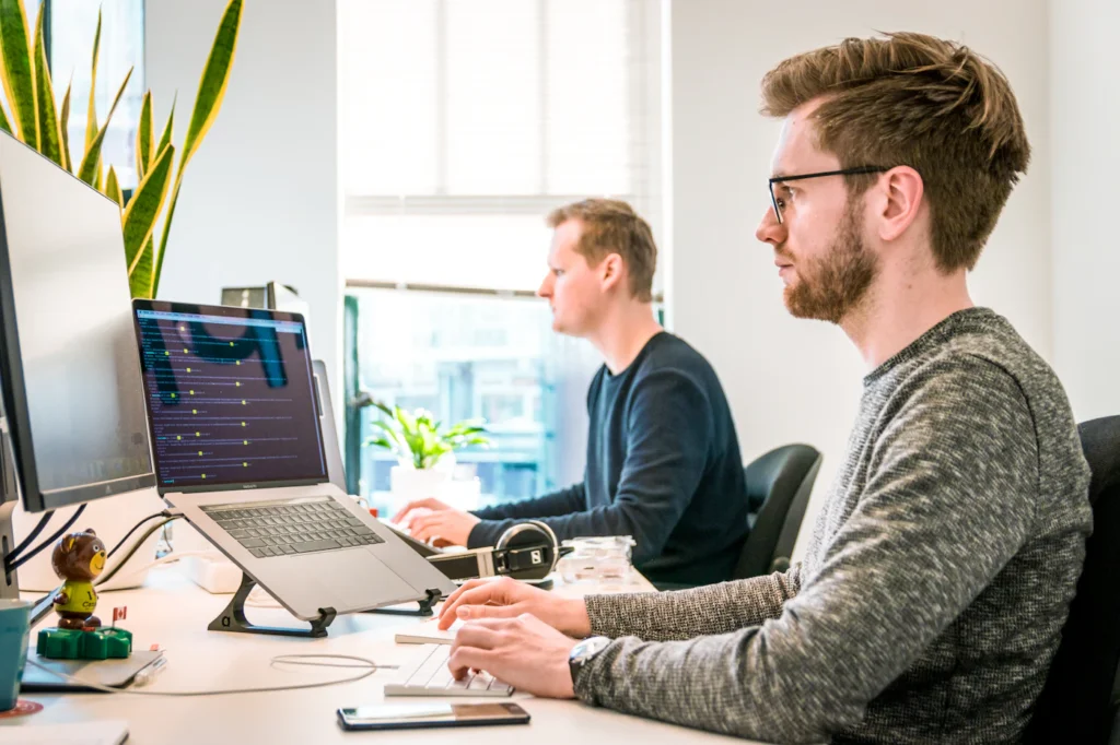 IT engineers working at their desks