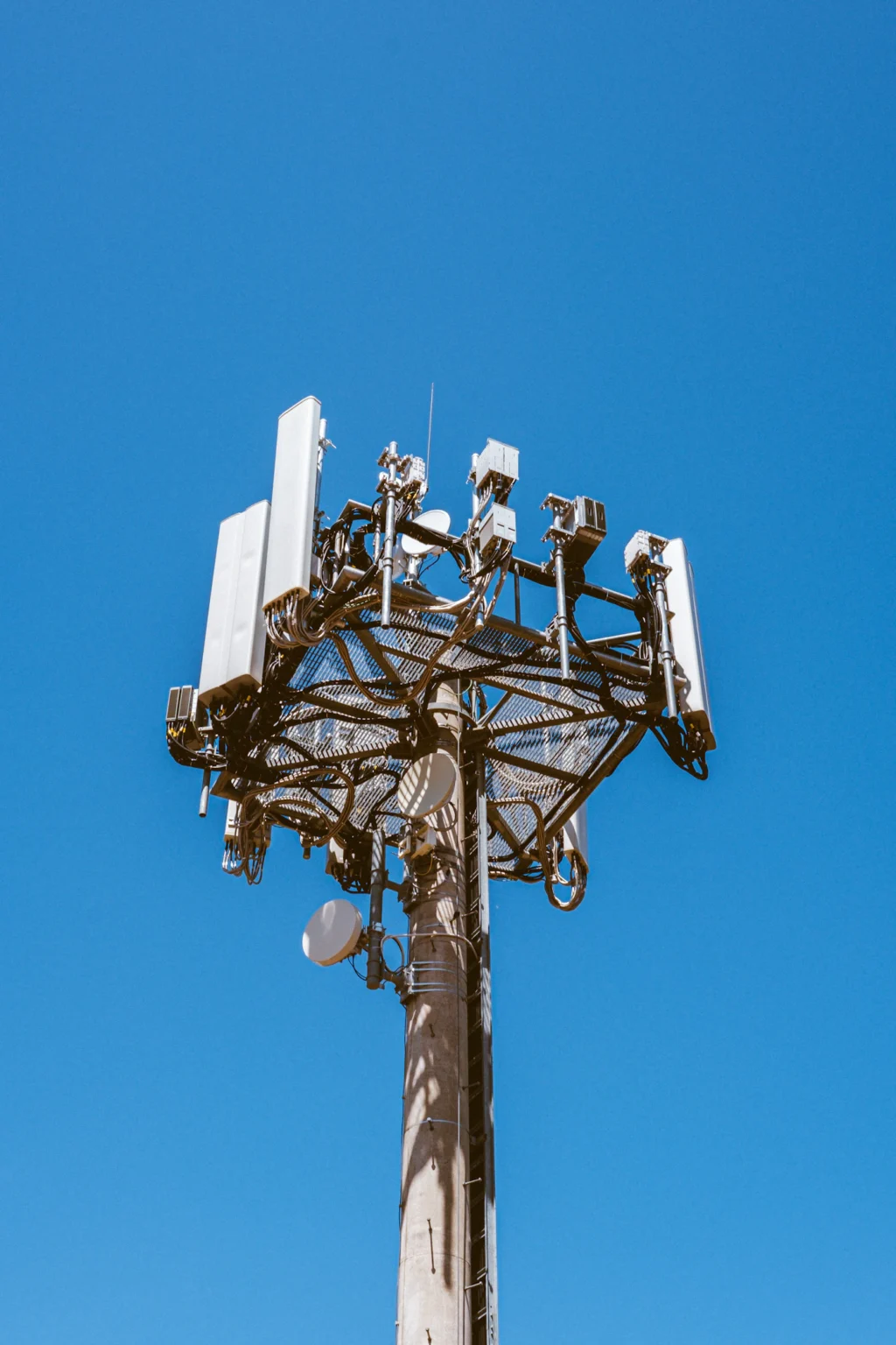 Telecom tower against a blue sky